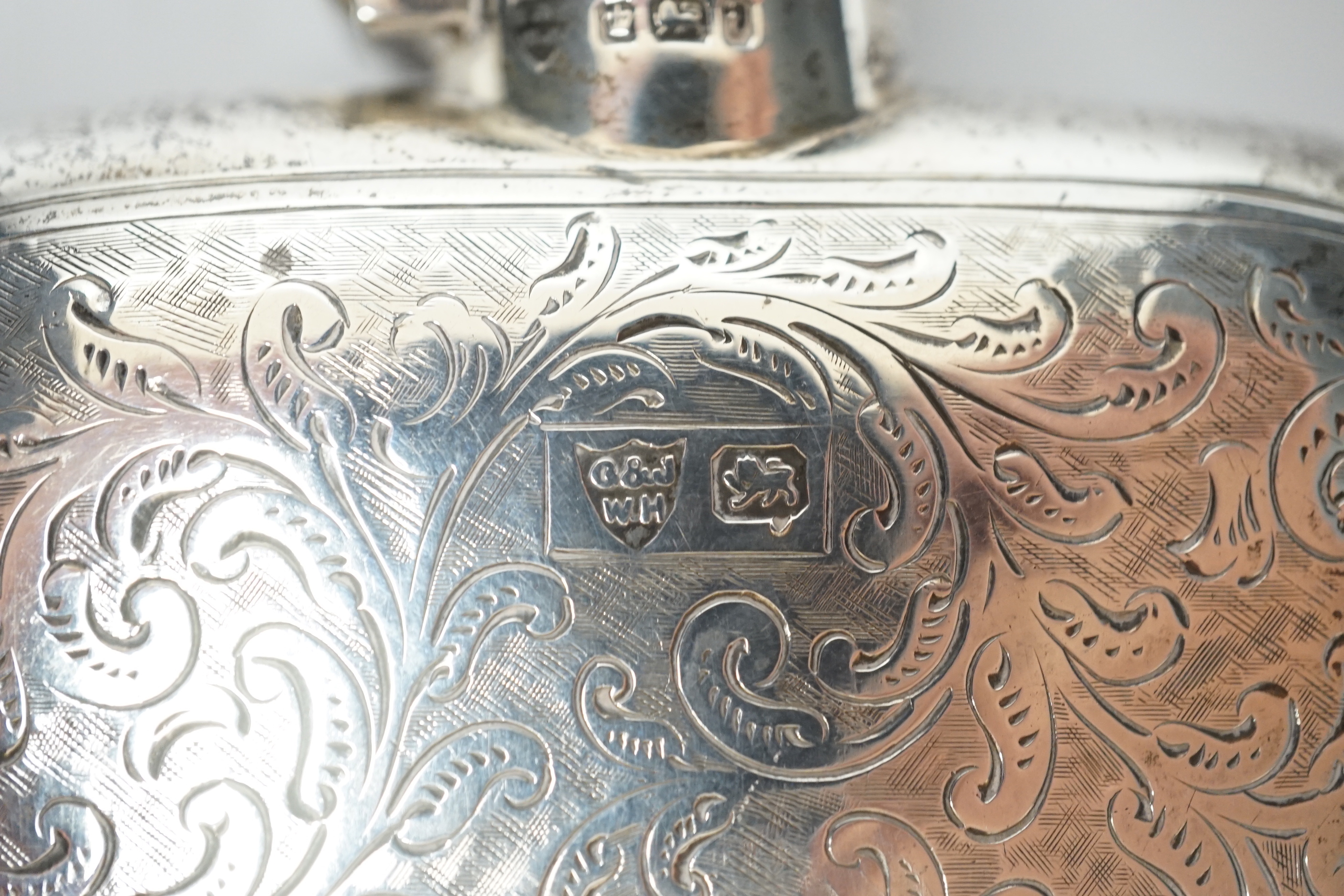 An Edwardian engraved silver hip flask, G & JW Hawksley, Sheffield, 1901, 13.7cm.